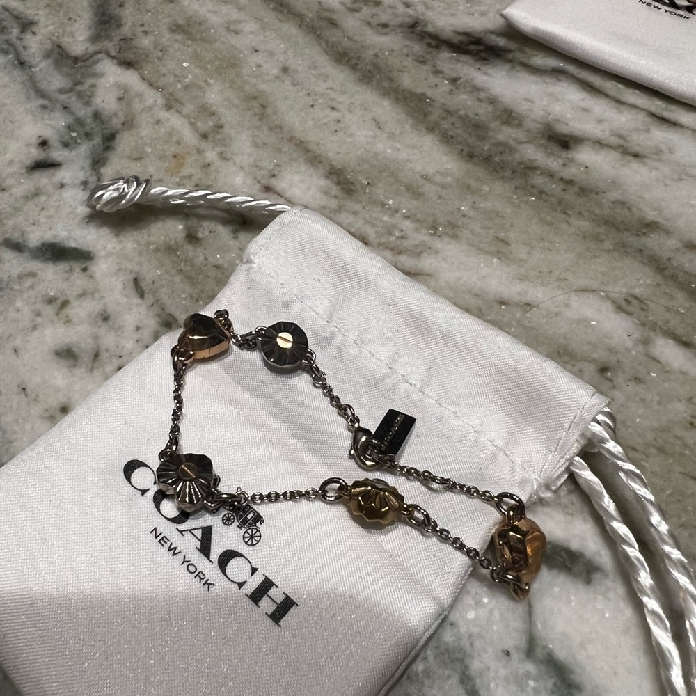 Coach Gold and Silver Heart Charm Bracelet